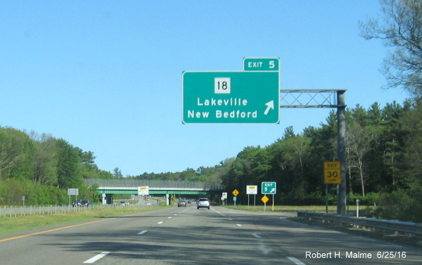 Image of recently placed overhead ramp sign for MA 18 exit on I-495 South in Middleboro in June 2016
