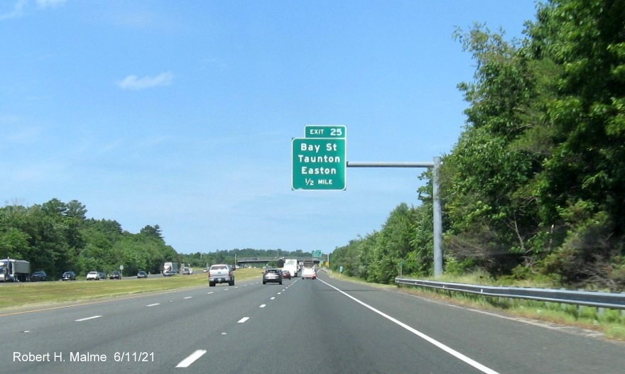 Image of 1/2 mile advance overhead sign for Bay Street exit with new milepost based exut number on I-495 North in Taunton, June 2021