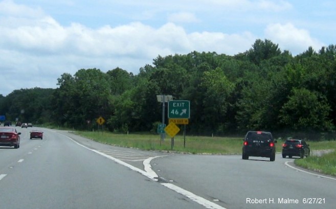 Image of gore sign for MA 126 exit with new milepost based exit number and yellow Old Exit 18 sign attached below on I-495 South in Bellingham, June 2021