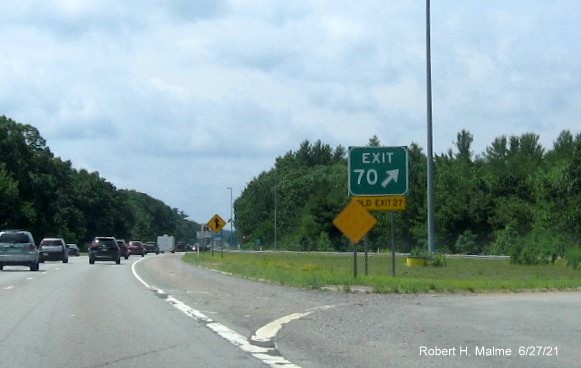 Image of overhead ramp sign for MA 117 exit with new milepost based exit number on I-495 South in Bolton, June 2021