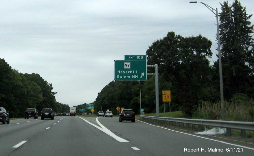 Image of overhead ramp sign for MA 97 exit with new milepost based exit number on I-495 North in Haverhill, June 2021