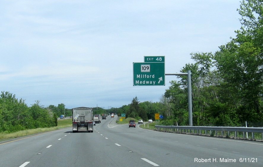 Image of overhead ramp sign for MA 109 exit with new milepost based exit number on I-495 North in Milford, June 2021
