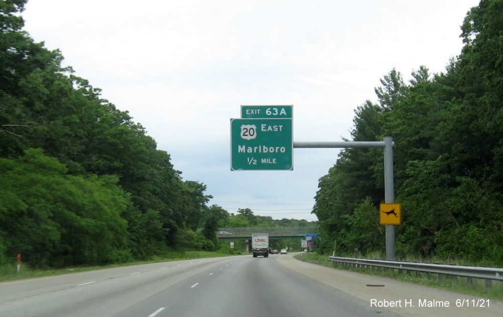 Image of 1/2 mile advance overhead sign for US 20 East exit with new milepost based exit number on I-495 North in Marlborough, June 2021