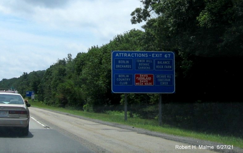 Image of overhead ramp sign for MA 62 exit with new milepost based exit number on I-495 South in Hudson, June 2021