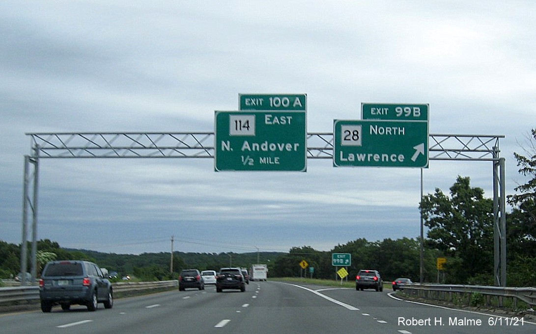 Image of overhead ramp sign for MA 28 North exit with new milepost based exit number on I-495 North in Andover, June 2021