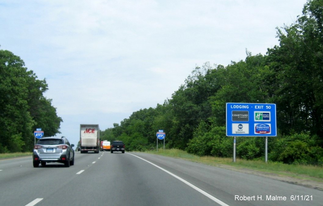 Image of auxiliary sign for MA 85 exit with new milepost based exit number on I-495 North in Milford, June 2021