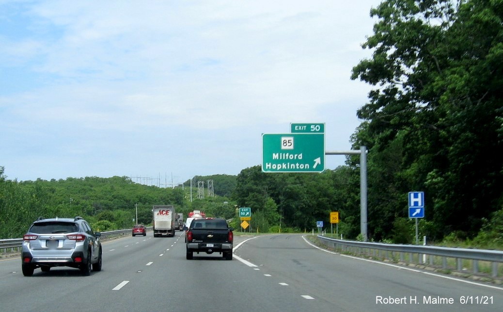 Image of overhead ramp sign for MA 85 exit with new milepost based exit number on I-495 North in Milford, June 2021