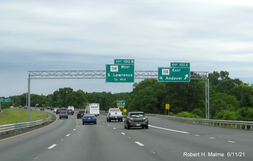 Image of overhead signage at ramp for MA 114 East exit with new milepost based exit number, but unchanged gore sign, on I-495 North in Andover, June 2021