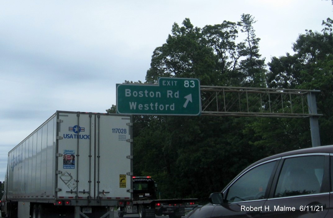 Image of overhead ramp sign for Boston Road exit with new milepost based exit number on I-495 North in Westford, June 2021
