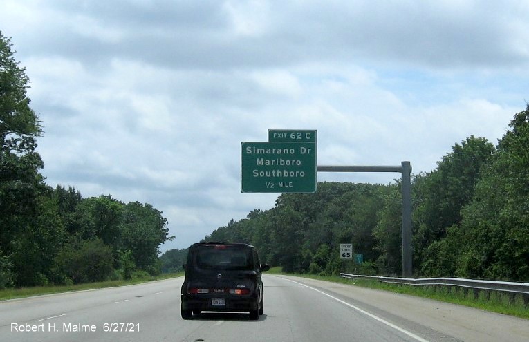 Image of 1/2 mile advance sign for Simarano Drive exit with new milepost based exit number but leftover sequential exit letter on I-495 South in Marlborough, June 2021