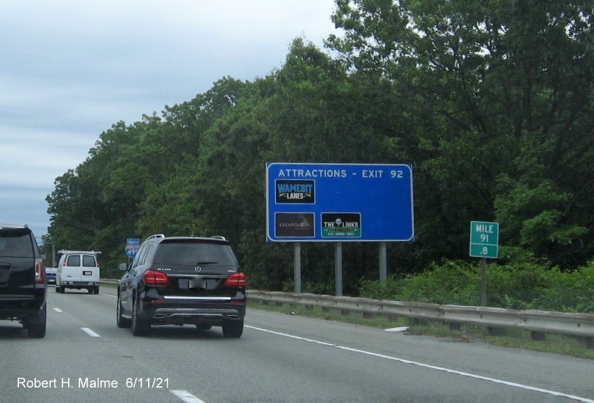 Image of auxiliary sign for MA 38 exit with new milepost based exit number on I-495 North in Tewksbury, June 2021