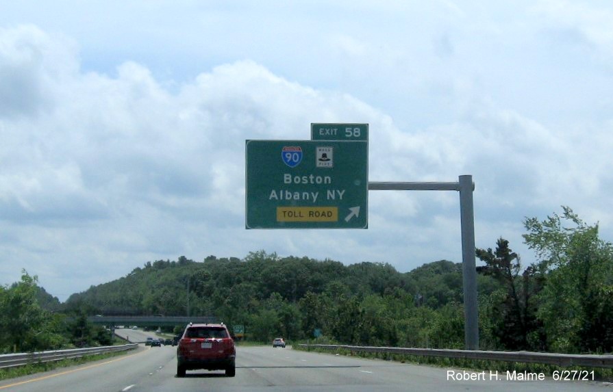 Image of overhead ramp sign for I-90/Mass Pike exit with new milepost based exit number on I-495 South in Hopkinton, June 2021