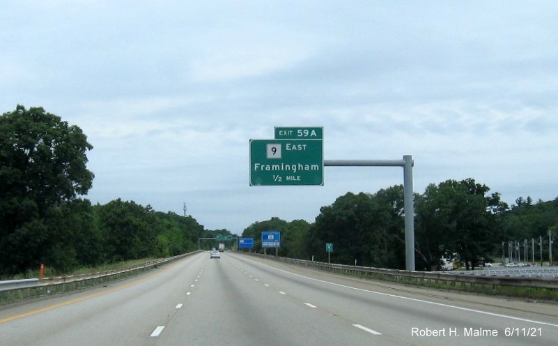 Image of 1/2 mile advance overhead sign for MA 9 East exit with new milepost based exit number on I-495 North in Marlborough, June 2021