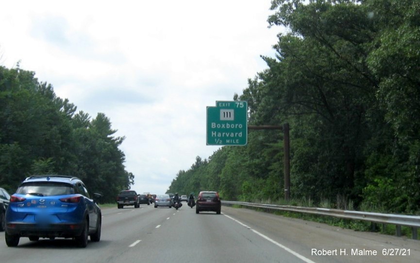 Image of 1/2 mile advance overhead sign for MA 111 exit with new milepost based exit number on I-495 South in Harvard, June 2021