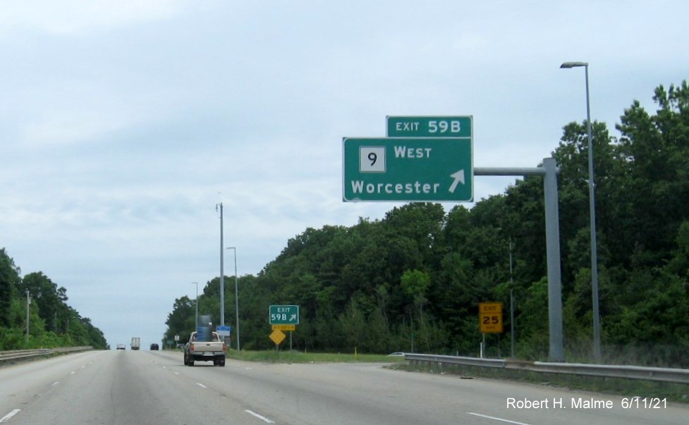 Image of overhead ramp sign for MA 9 West exit with new milepost based exit number on I-495 North in Hopkinton, June 2021