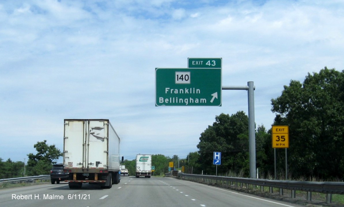 Image of overhead ramp sign for MA 140 Franklin exit with new milepost based exit number on I-495 North in Franklin, June 2021