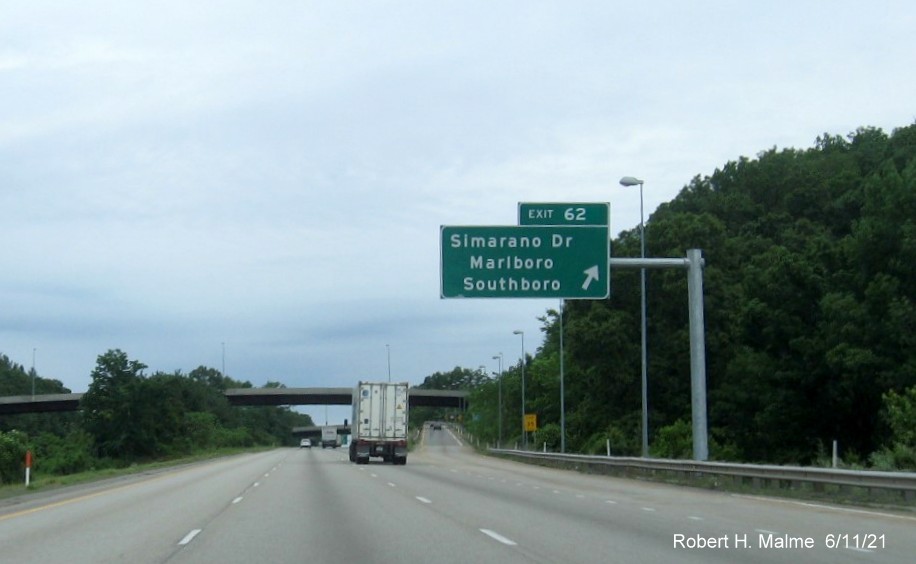 Image of overhead ramp sign for Simarano Drive exit with new milepost based exit number on I-495 North in Southborough, June 2021