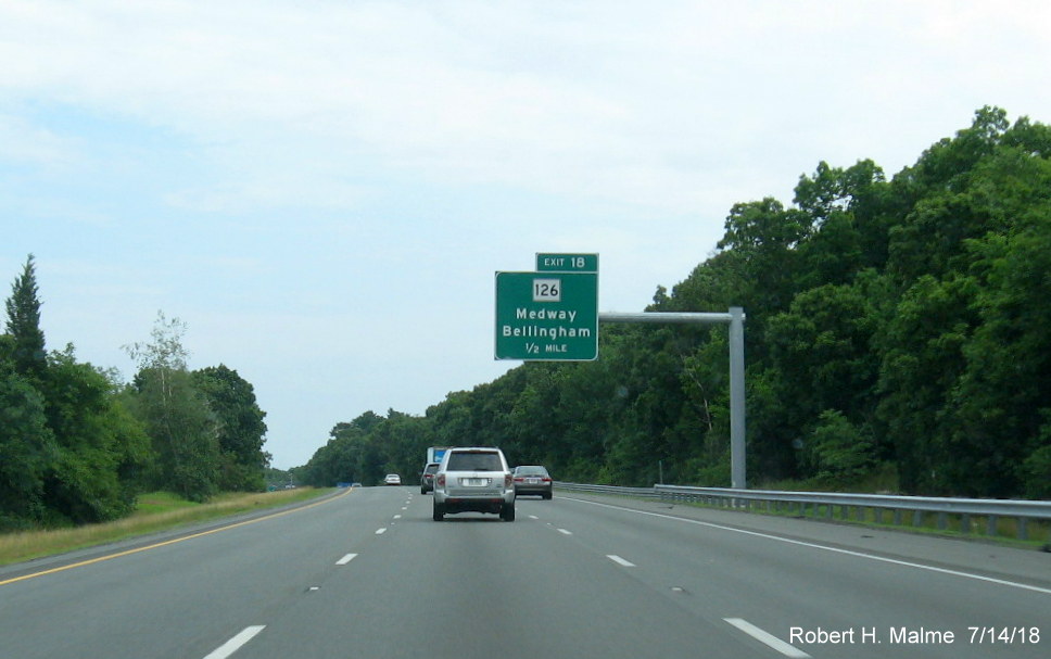 Image of recently placed 1-mile advance overhead sign for MA 126 exit on I-495 South in Bellingham in July 2018