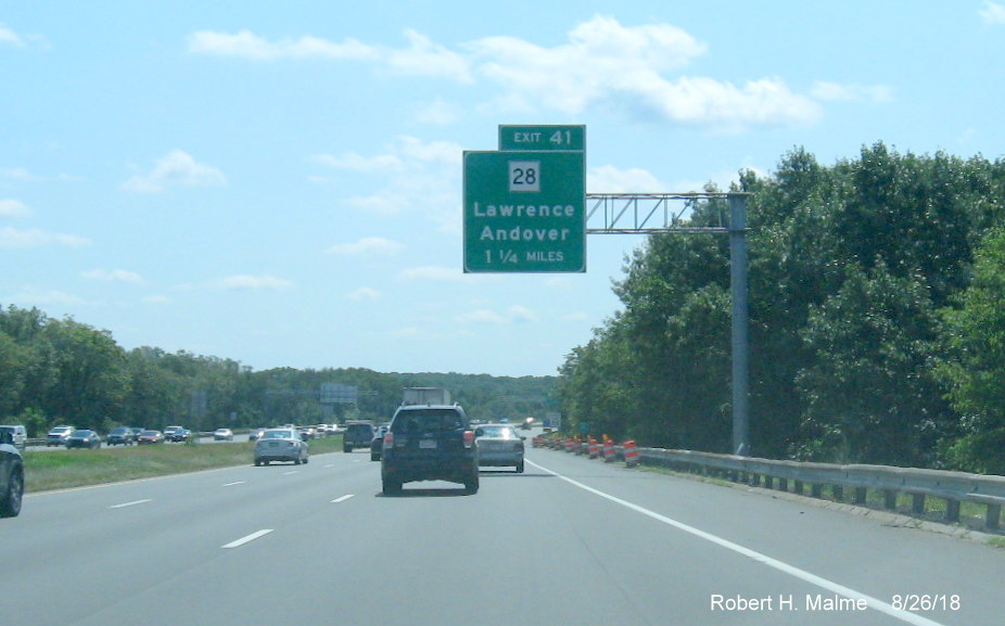 Image of 1 1/4 mile advance overhead sign for MA 28 exit on I-495 South in Lawrence in August 2018