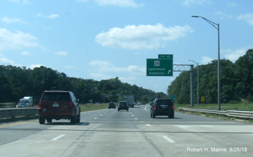 Image of overhead ramp signage for MA 28 exit on I-495 South in Lawrence in August 2018