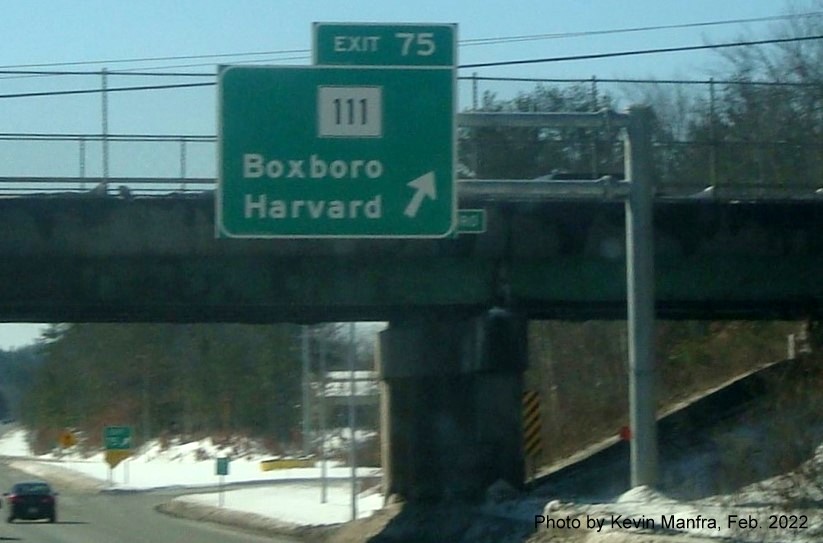Image of recently installed overhead ramp sign for MA 111 exit on I-495 South in Harvard, by Kevin Manfra, February 2022