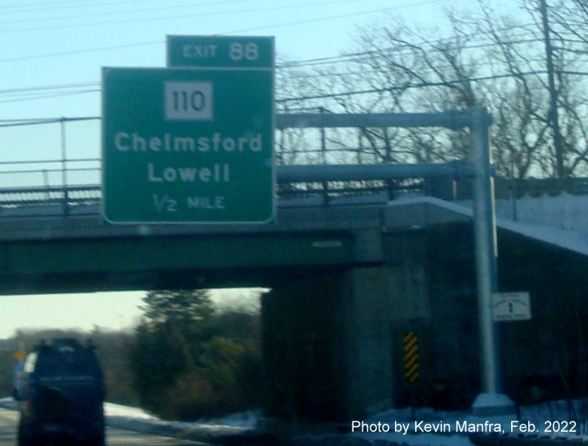 Image of recently placed 1/2 Mile advance overhead sign for MA 110 exit on I-495 North in Chelmsford, by Kevin Manfra, February 2022