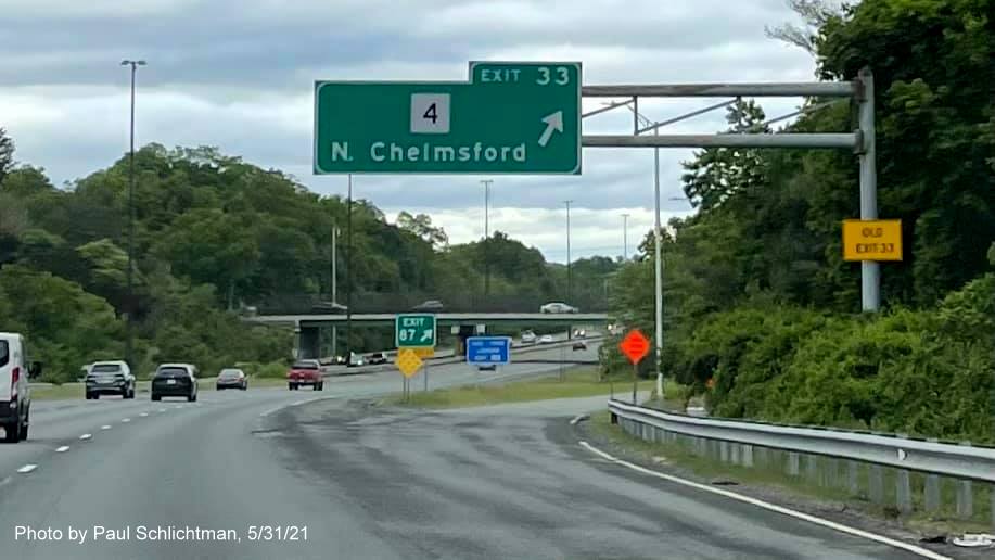 Image of overhead ramp sign for MA 4 exit without new milepost based exit number on I-495 North in Chelmsford, by Paul Schlichtman, May 2021