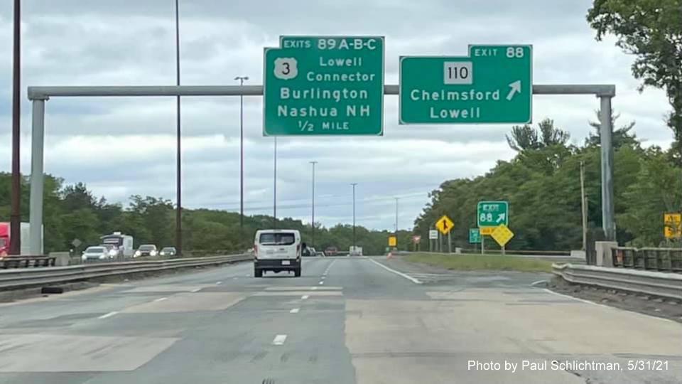 Image of overhead ramp sign for MA 110 exit with new milepost based exit number on I-495 North in Chelmsford, by Paul Schlichtman, May 2021