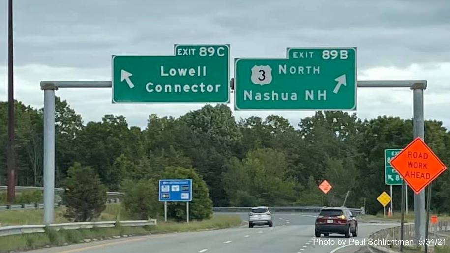 Image of overhead signs for US 3 North and Lowell Connector exits with new milepost based exit numbers on I-495 North in Chelmsford, by Paul Schlichtman, May 2021