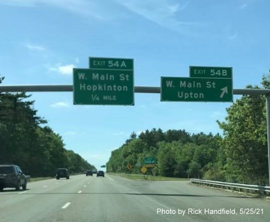 Image of overhead signage at ramp for West Main Street North exit with new milepost based exit number on I-495 South in Hopkinton, by Rick Handfield, May 2021 