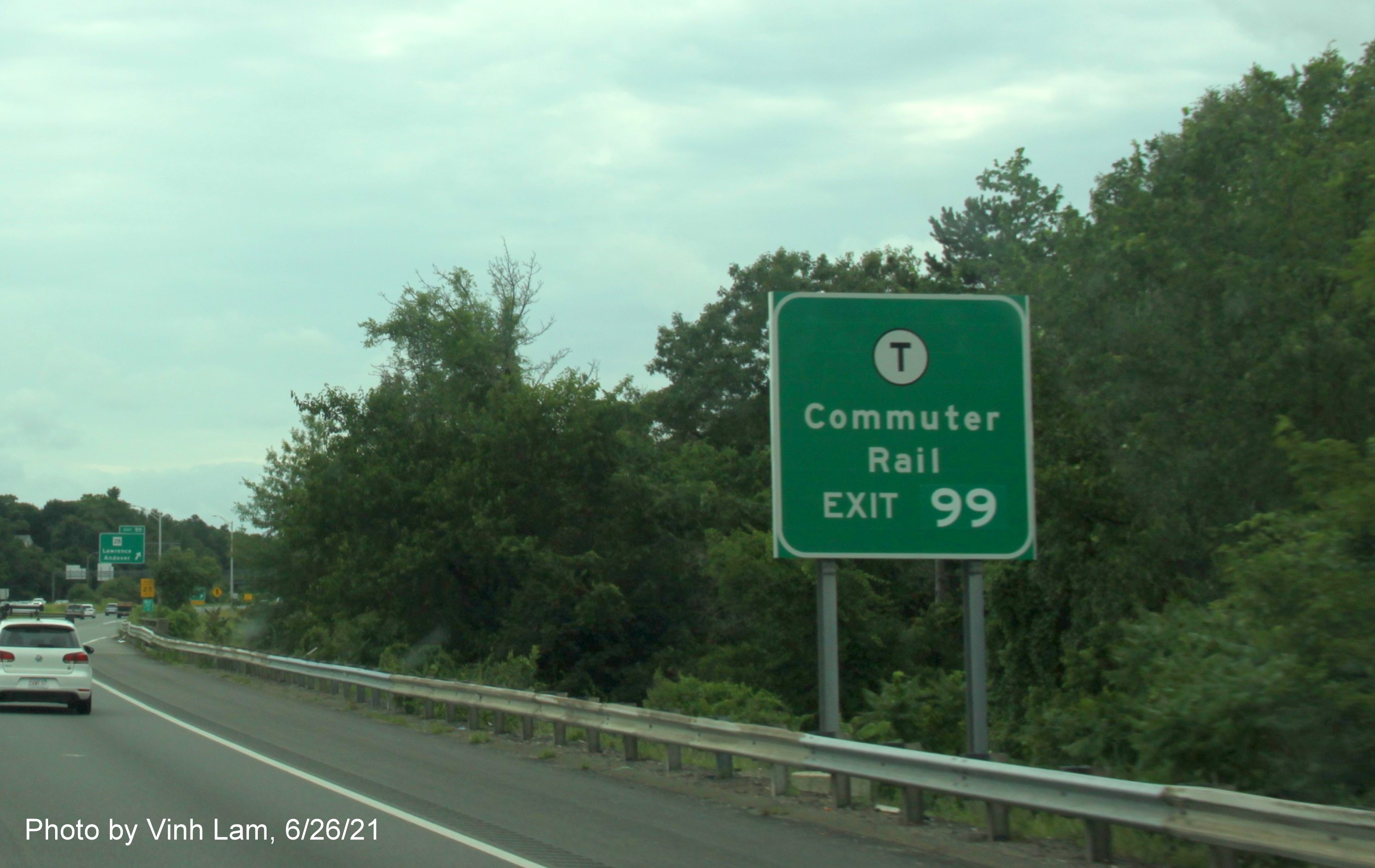 Image of auxiliary sign for MA 28 exit with new milepost based exit number on I-495 South in Andover, by Vinh Lam, June 2021
