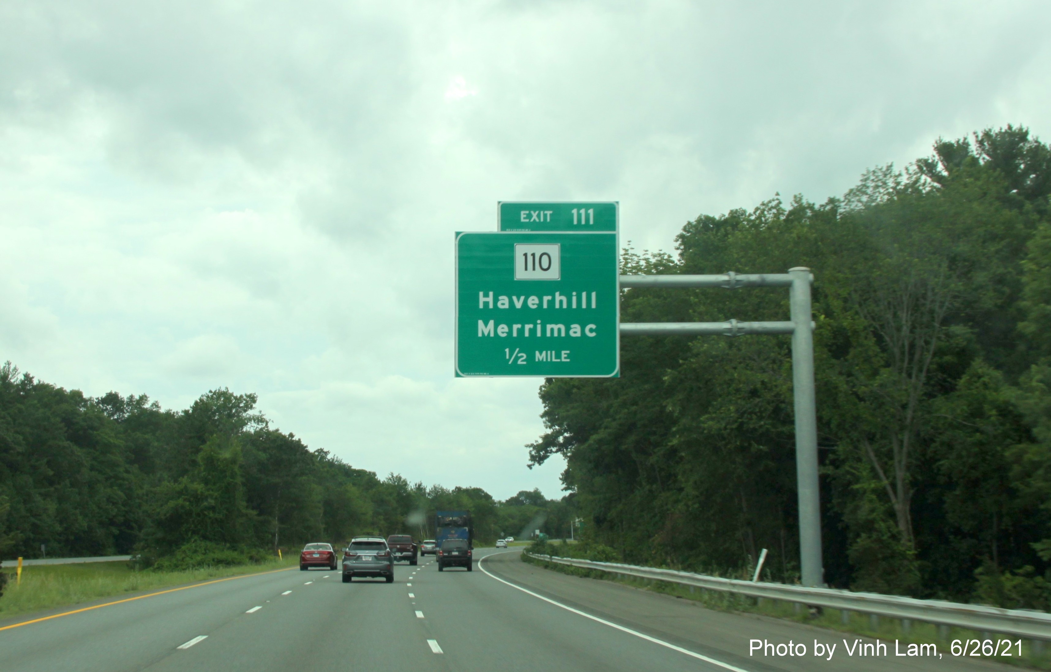 Image of 1/2 mile advance overhead sign for MA 110 exit with new milepost based exit number on I-495 South in Haverhill, photo by Vinh Lam, June 2021