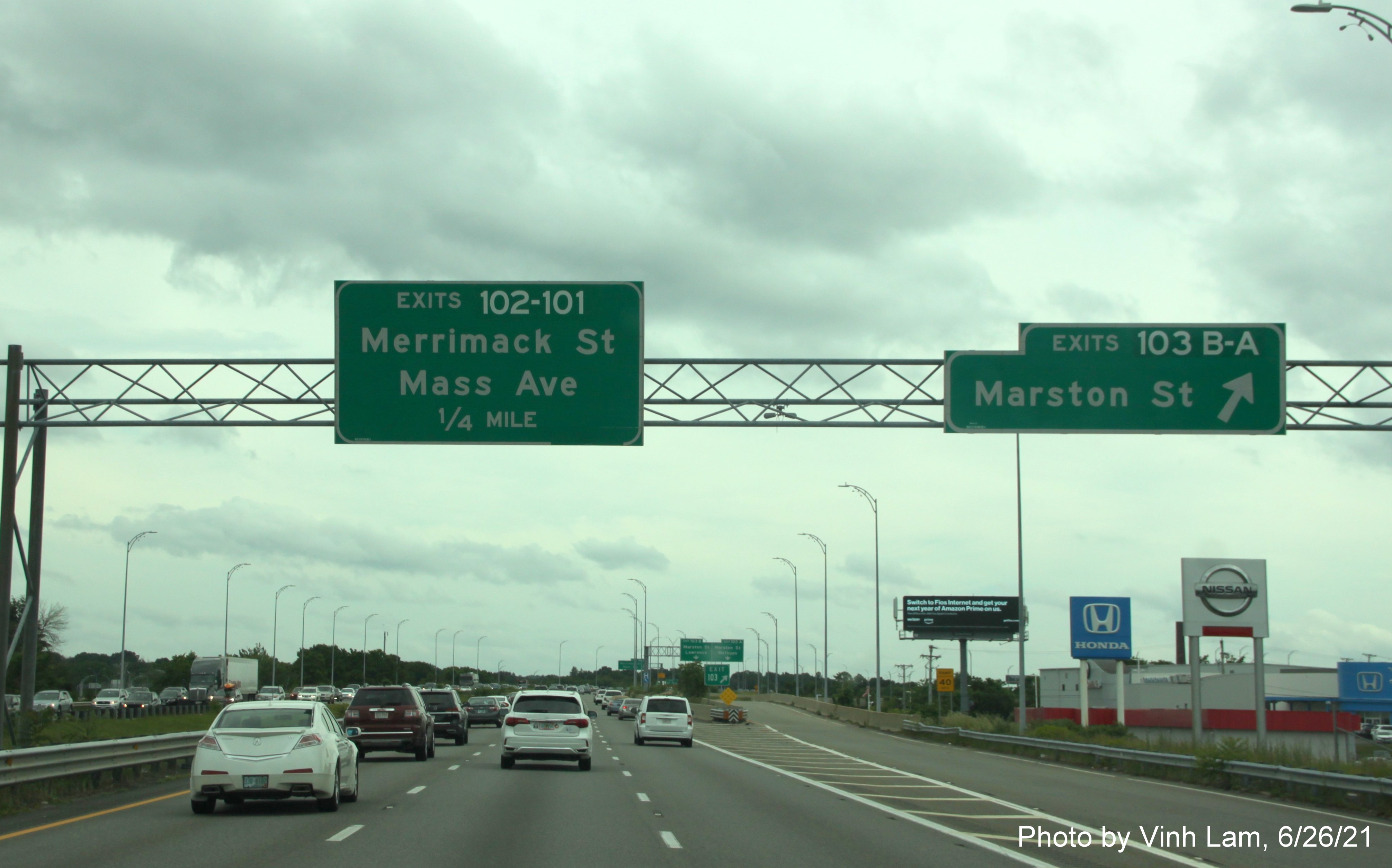Image of overhead ramp sign for Marston Street exits with new milepost based exit number on 
                                             I-495 South in Lawrence, photo by Vinh Lam, June 2021