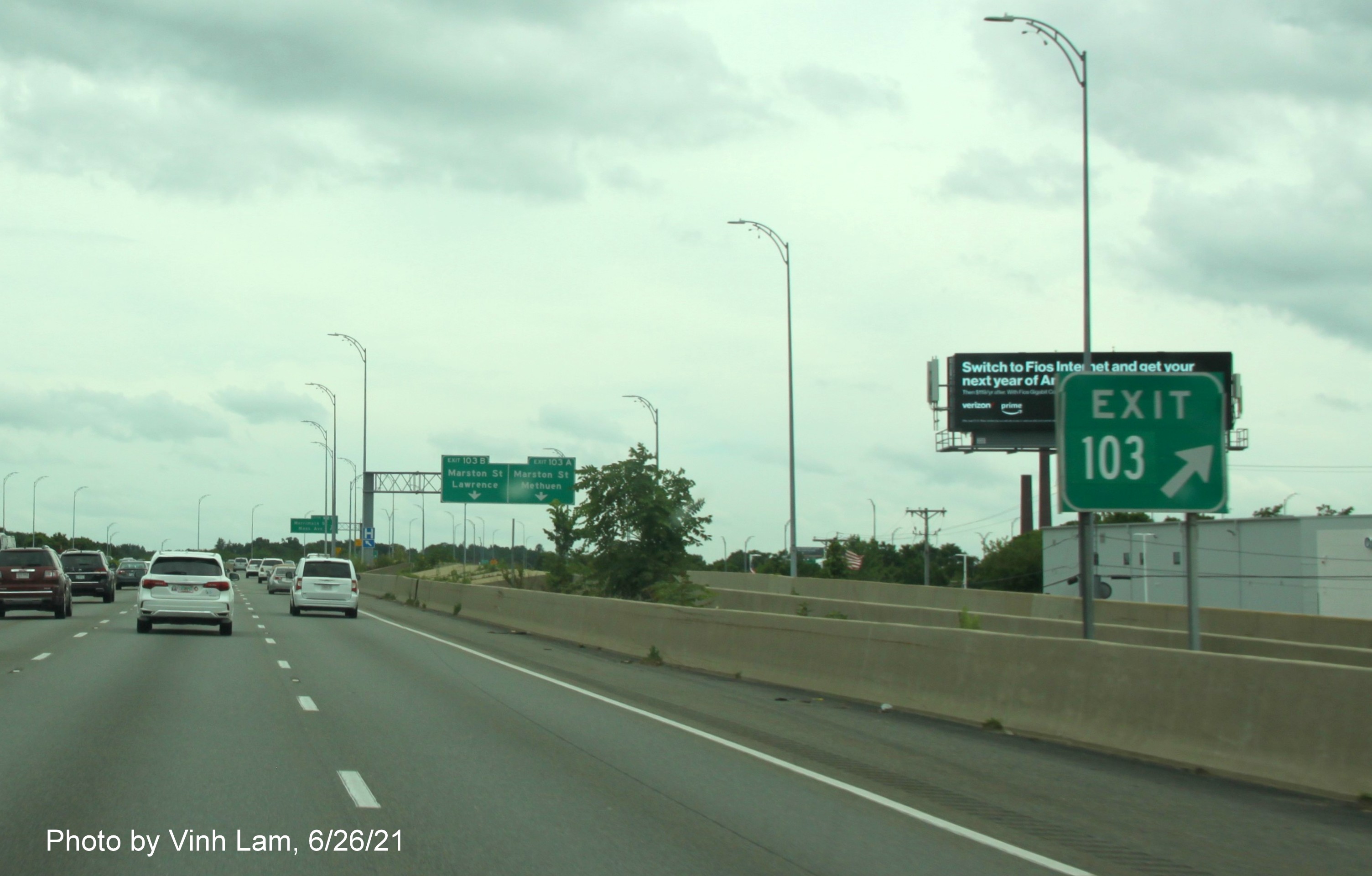 Image of gore sign for Marston Street exits with new milepost based exit number, but no Old Exit sign, on 
                                             I-495 South in Methuen, photo by Vinh Lam, June 2021