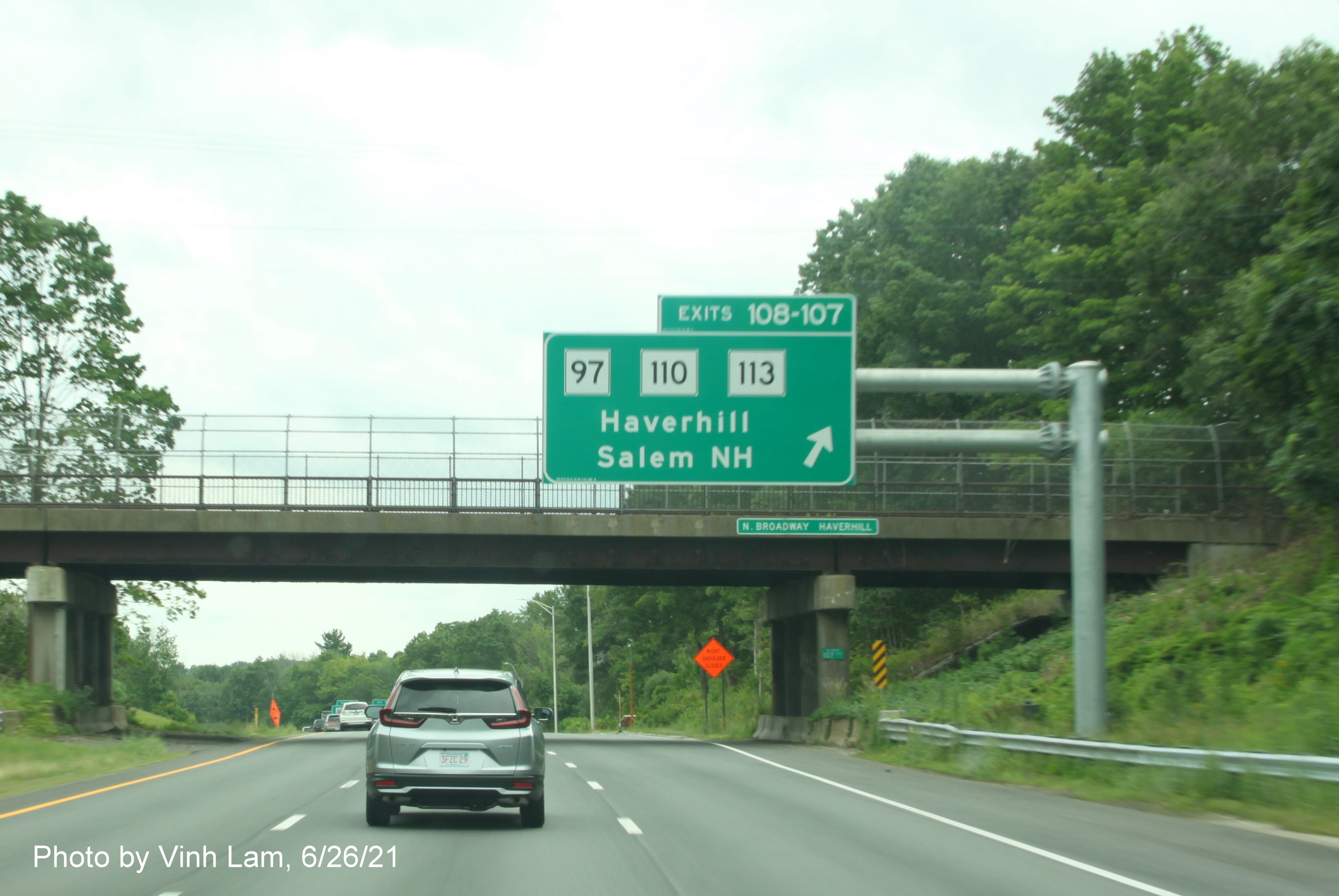 Image of overhead ramp sign for C/D lanes for MA 97 and MA 110/113 exits with new milepost based exit numbers on I-495 South in Haverhill, photo by Vinh Lam, June 2021