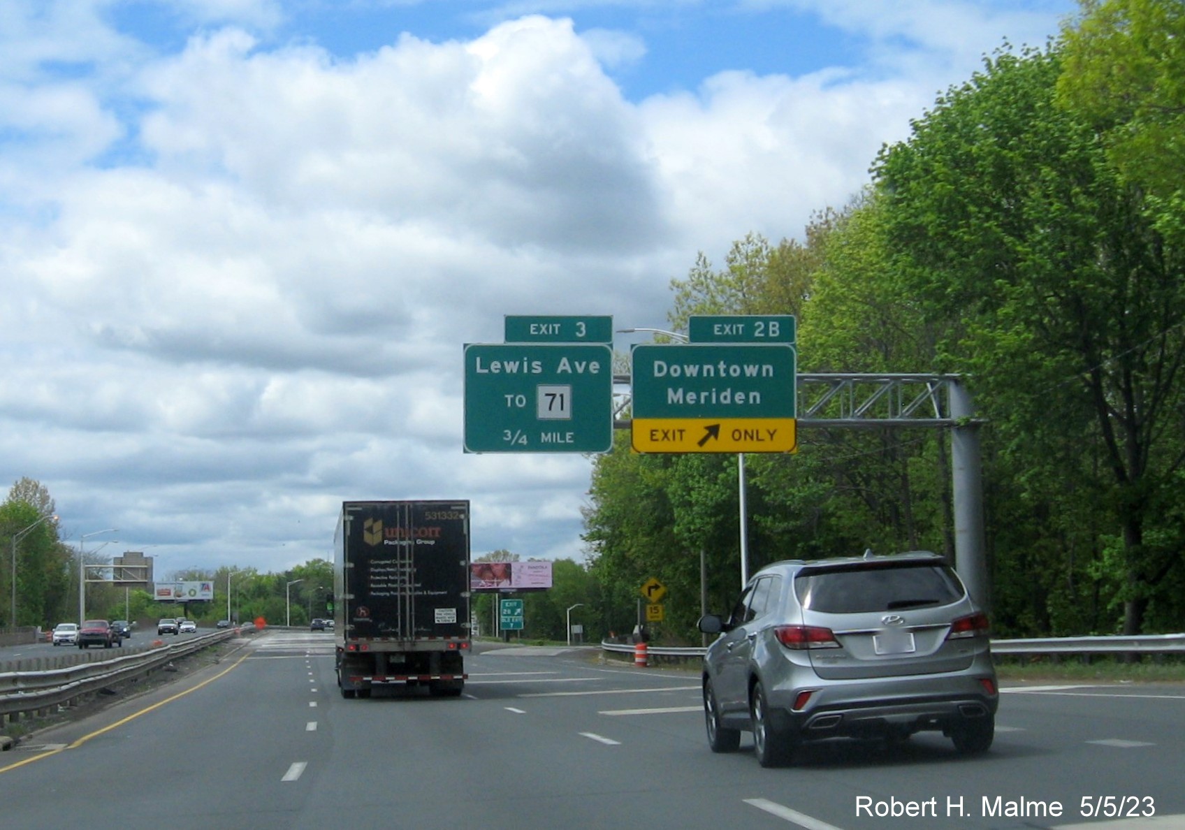 Image of gore sign for Downtown Meriden exit with new milepost based exit number on I-691 West in Meriden CT, May 2023