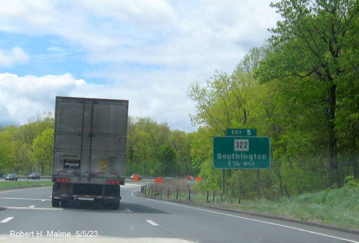 Image of 1 1/4 miles advance sign for CT 322 exit with new milepost based exit number on I-691 West in Southington, May 2023