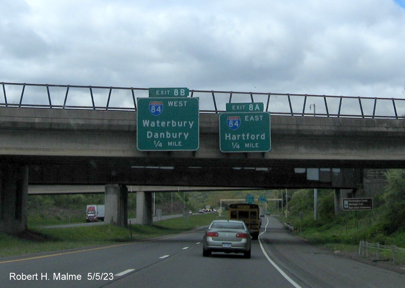 Image of 1/4 mile advance signs for I-84 exits with new milepost based exit numbers on I-691 West in Cheshire, May 2023
