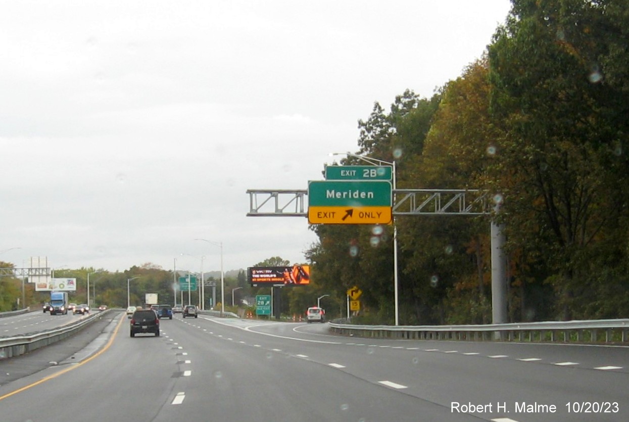 Image of new overhead ramp sign for the Meriden exit with new milepost based exit number 
         on I-691 West in Meriden, October 2023