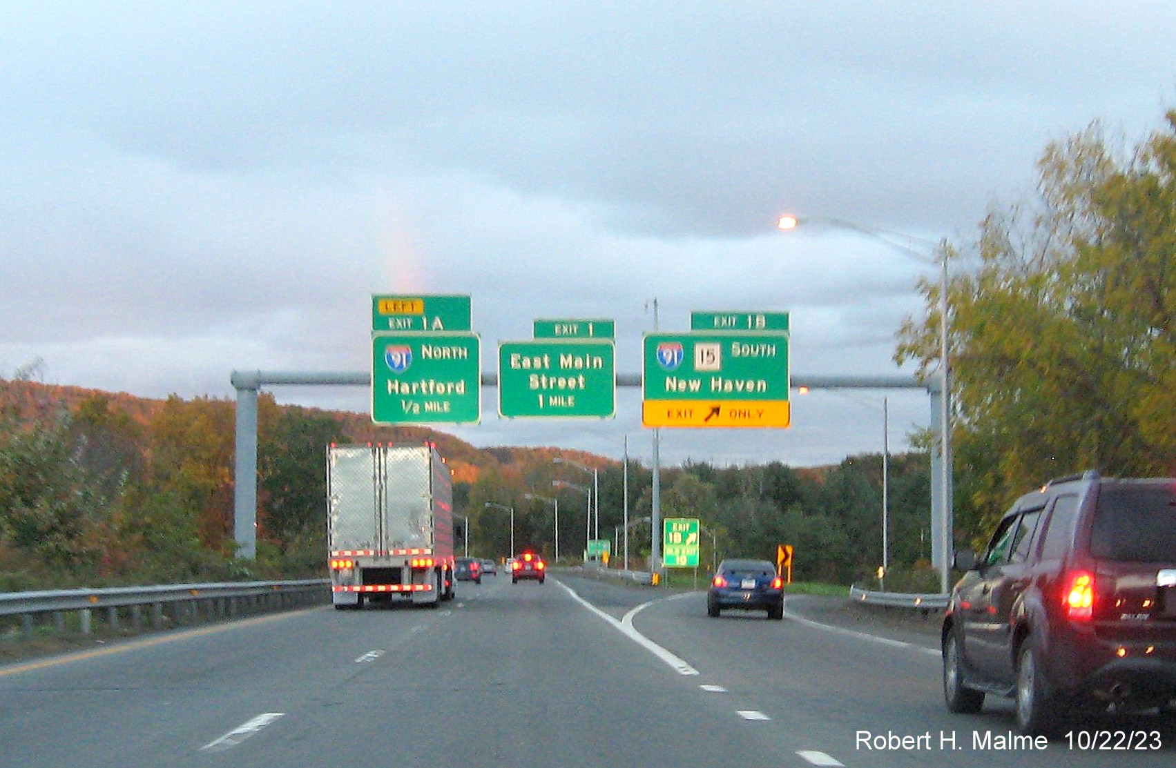 Image of new overhead signs at the I-91 South exit with the new milepost based exit numbers, October 2023