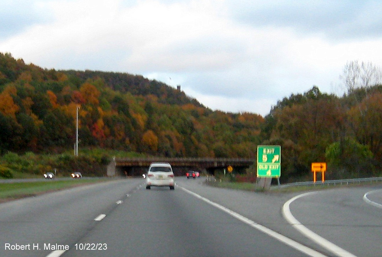 Image of new 1 mile advance sign for CT 322 exit with new milepost exit number on I-691 East in Southington, October 2023