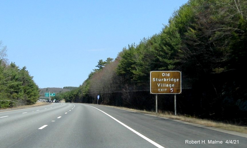 Image of brown cultural attractions sign for To MA 131 exit with new milepost based exit number on I-84 East in Sturbridge, April 2021