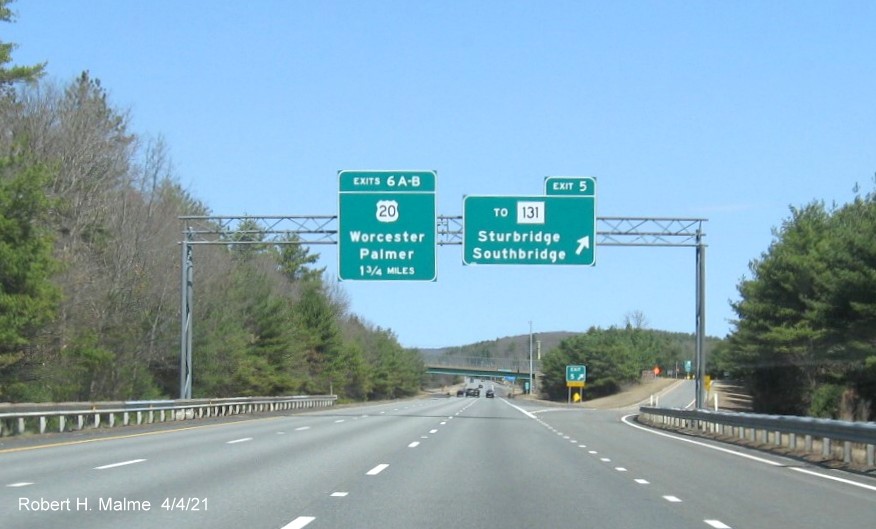 Image of overhead ramp sign for To MA 131 exit with new milepost based exit number on I-84 East in Sturbridge, April 2021