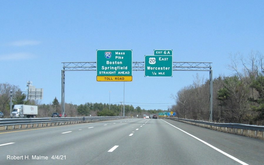 Image of 1/4 advance overhead sign US 20 East exit with new milepost based exit number on I-84 East in Sturbridge, April 2021