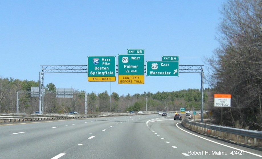 Image of overhead signs at ramp for US 20 East exit with new milepost based exit number on I-84 East in Sturbridge, April 2021