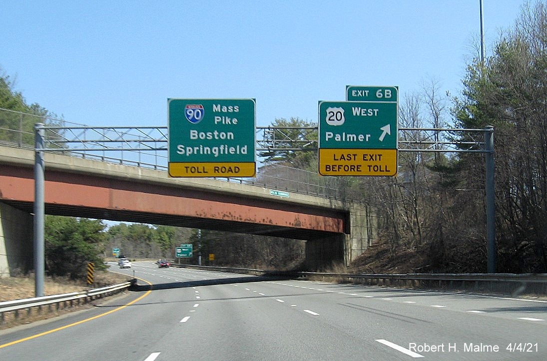 Image of overhead signs approaching ramp for US 20 West exit with new milepost based exit number on I-84 East in Sturbridge, April 2021