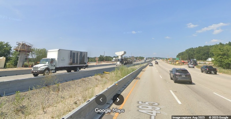Image of support construction for flyover ramps as part of I-90 interchange construction 
	on I-495 North in Hopkinton, Google Maps Street View, August 2025