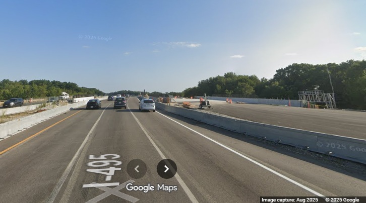 Image of bridge construction prior to the I-90 exit in work zone for Mass Pike 
	interchange construction on I-495 South in Hopkinton, Google Maps Street View, August 2025