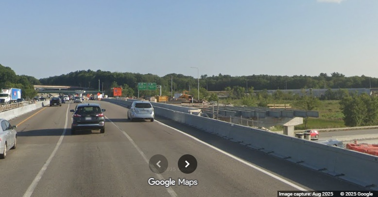 Image of future I-495 South bridge still construction over I-90/Mass Pike as part of new
	interchange construction in Hopkinton, Google Maps Street View, August 2025