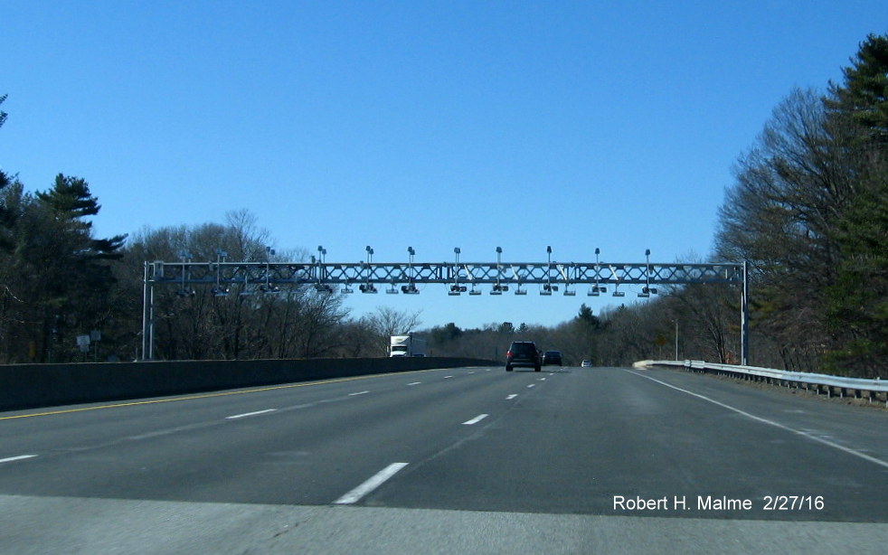 Image of new electronic toll gantry over lanes of I-90 Mass Pike near Framingham